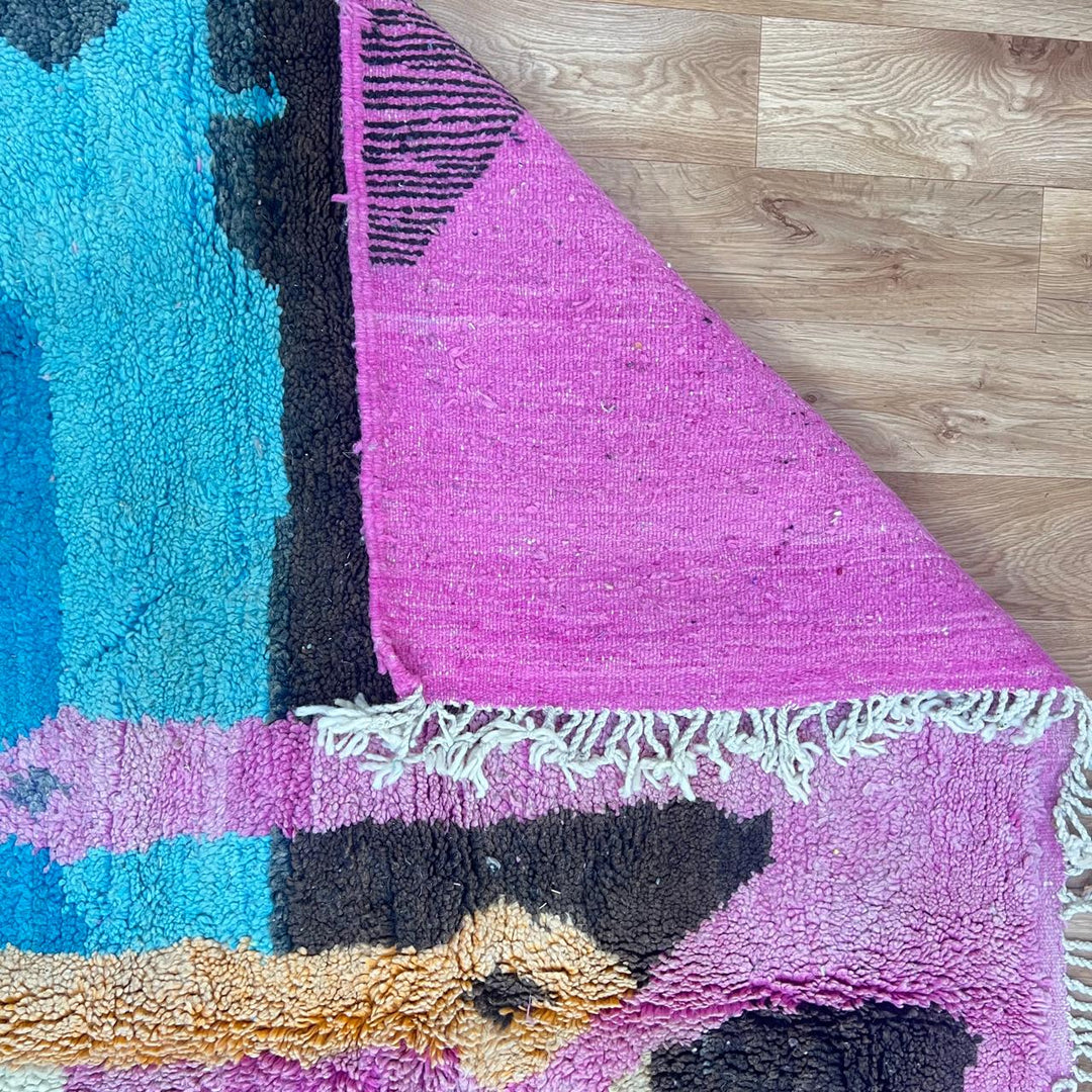 Vintage Moroccan wool rug 842 – handmade Berber carpet in multicolor abstract design with pink, yellow, turquoise, and cream tones (296 × 200 cm).