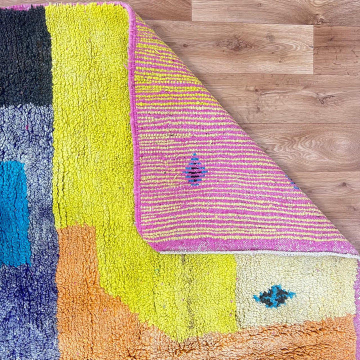 Vintage Moroccan wool rug 842 – handmade Berber carpet in multicolor abstract design with pink, yellow, turquoise, and cream tones (296 × 200 cm).