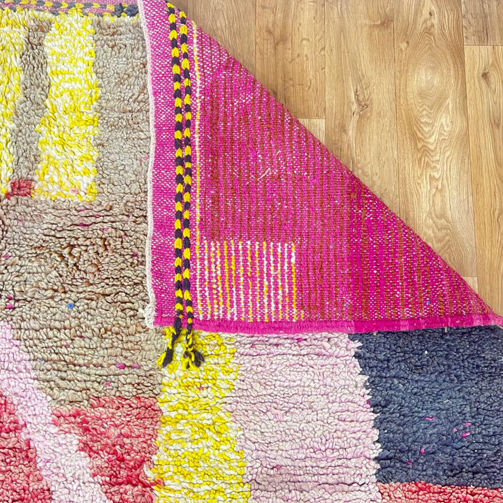 Vintage Moroccan wool rug 916 – handmade Berber rug with colorful abstract design in yellow, pink, and red tones (314 × 200 cm).