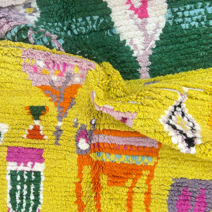 Vintage Moroccan Wool Rug 14 – handmade yellow and green Berber rug with colorful tribal motifs (211 × 126 cm).