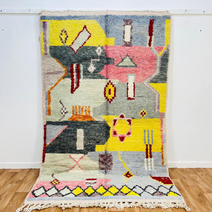 Vintage Moroccan wool rug with colorful abstract Berber geometric patterns in grey, pink, yellow and ivory, handmade in Morocco, 257x158 cm