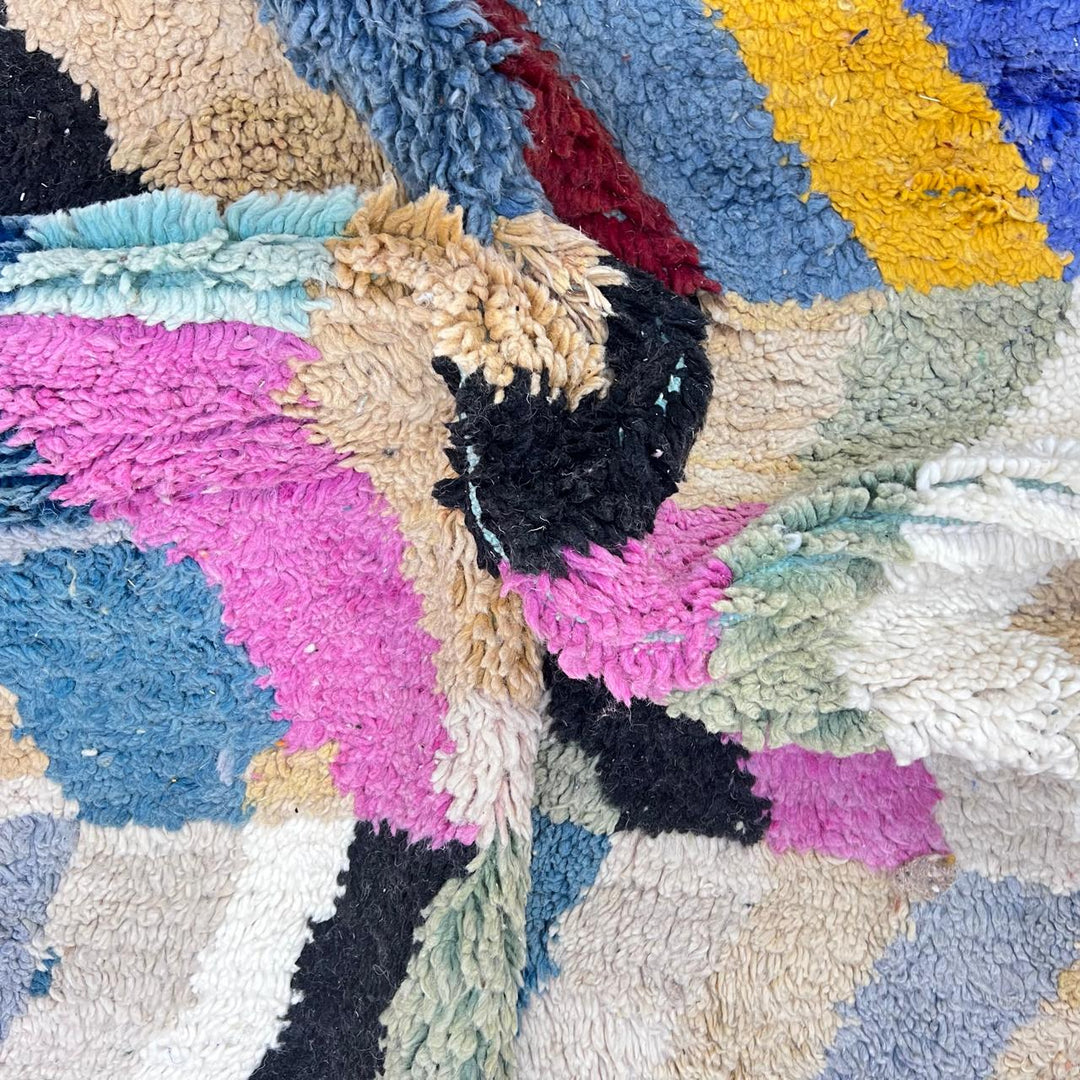 Vintage Moroccan wool rug 773 – colorful handmade Berber carpet with zigzag chevron patterns in blue, pink, yellow, and cream, 264 × 164 cm (8.66 × 5.38 ft).