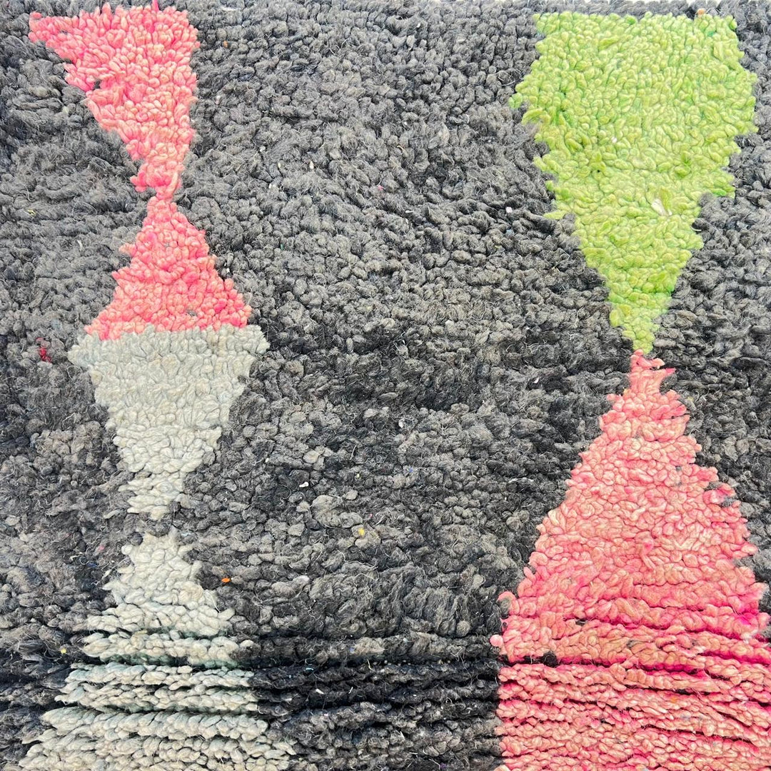 Vintage Moroccan wool rug 731 – handmade Berber carpet with black, green, pink, and grey abstract tribal patterns (233 × 147 cm / 7.64 × 4.82 ft).