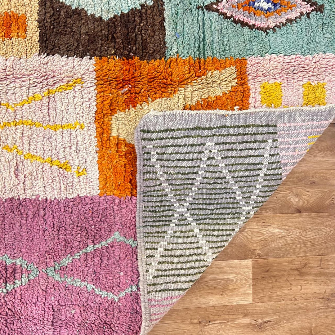 Vintage Moroccan wool rug 250 – handwoven Berber patchwork design in pink, yellow and green tones (254 × 155 cm).
