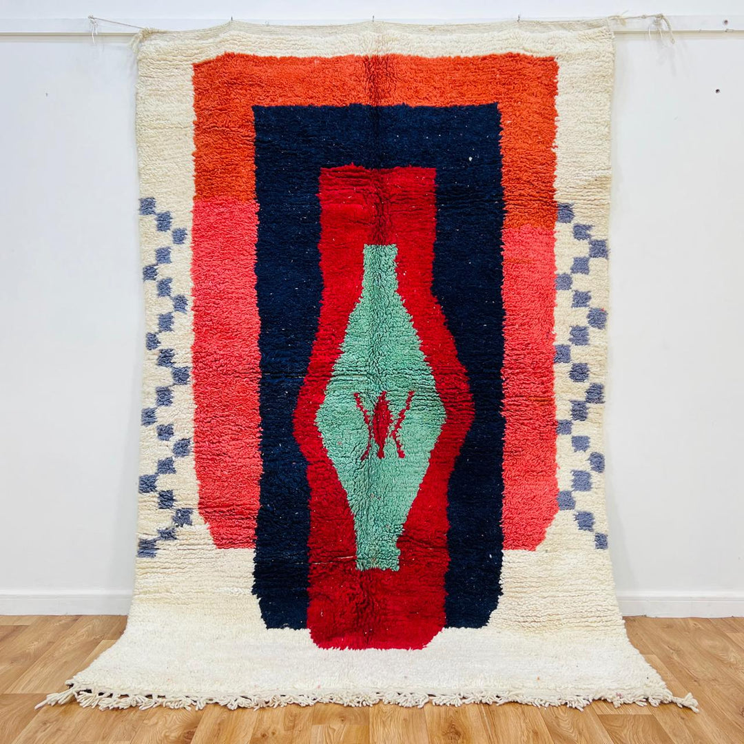 Vintage Moroccan wool rug with bold geometric Berber design in red, navy and mint