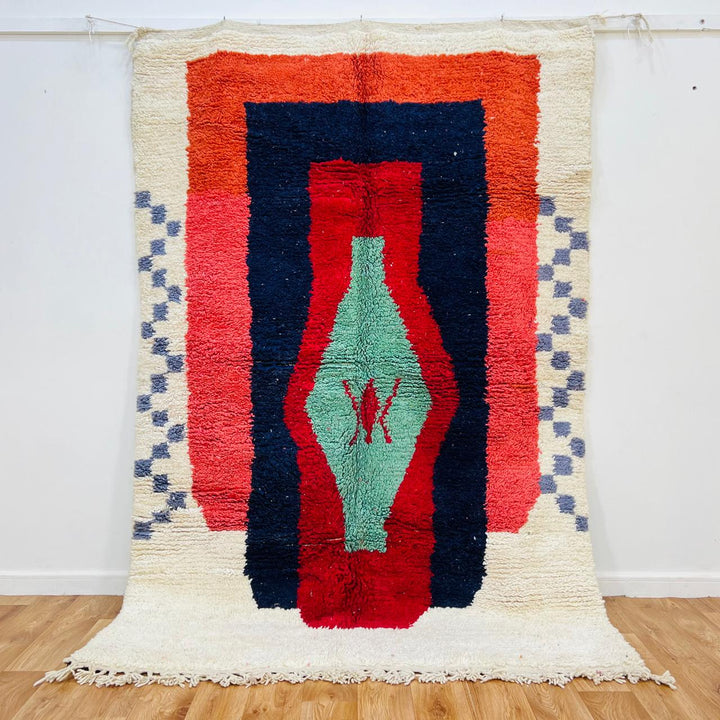 Vintage Moroccan wool rug with bold geometric Berber design in red, navy and mint