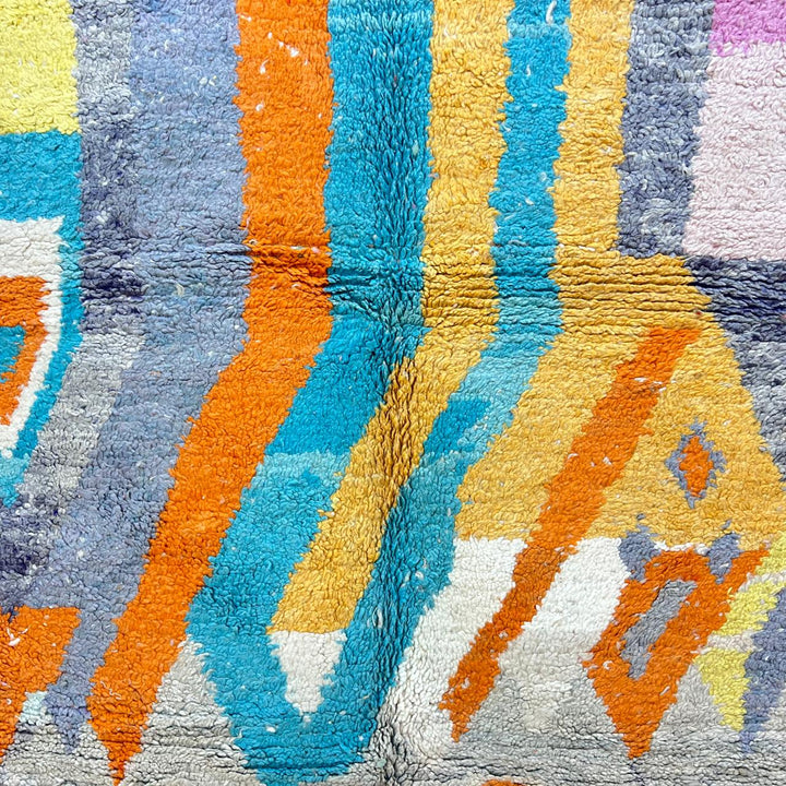 Vintage Moroccan wool rug 782 – cream and colorful handmade Berber carpet with geometric orange, turquoise, and grey patterns, 271 × 170 cm (8.89 × 5.57 ft).