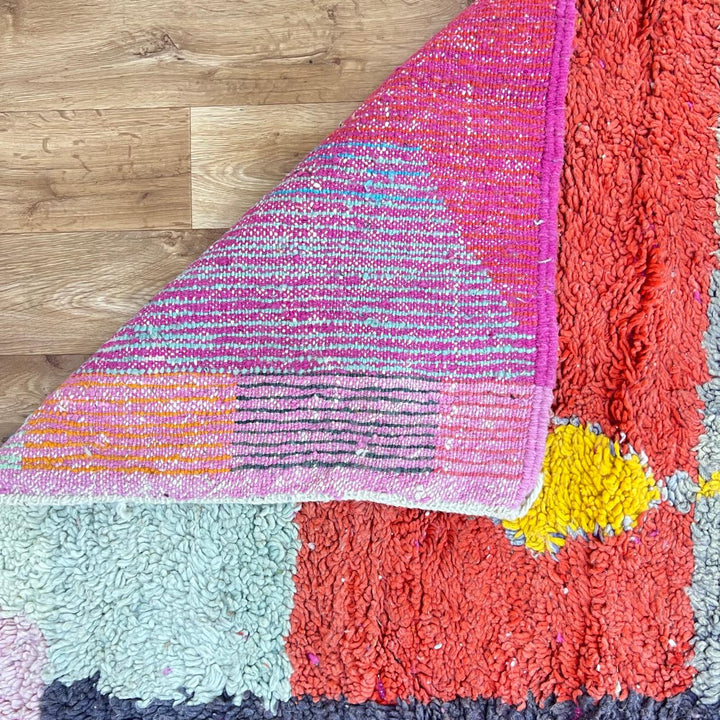 Vintage Moroccan wool rug 824 – handmade Berber carpet with yellow, blue, red, and gray abstract patterns, medium pile (299 × 200 cm / 9.81 × 6.56 ft).