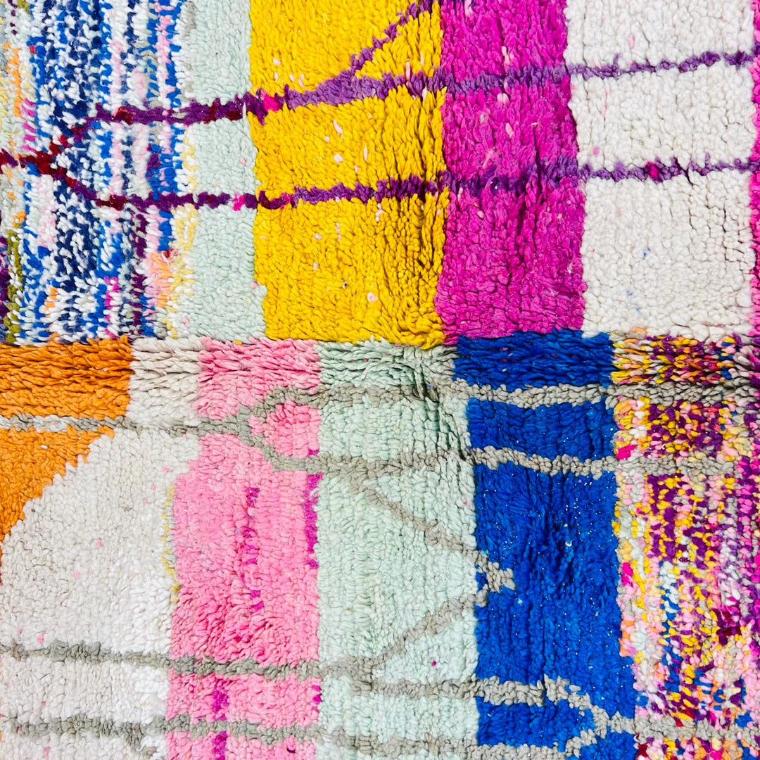 Vintage Moroccan Berber wool rug with colorful geometric patchwork pattern