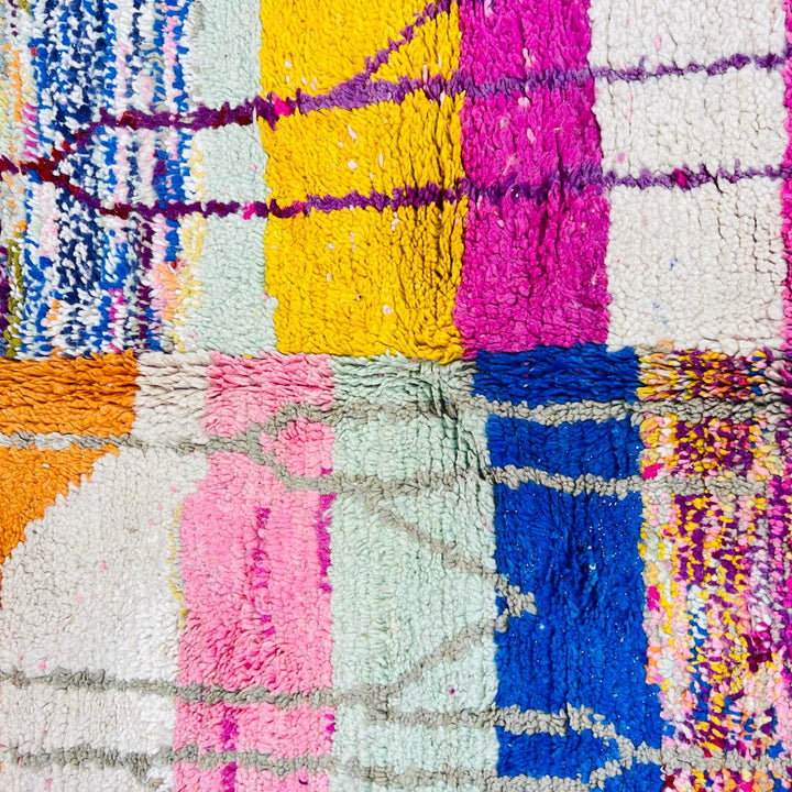 Vintage Moroccan Berber wool rug with colorful geometric patchwork pattern