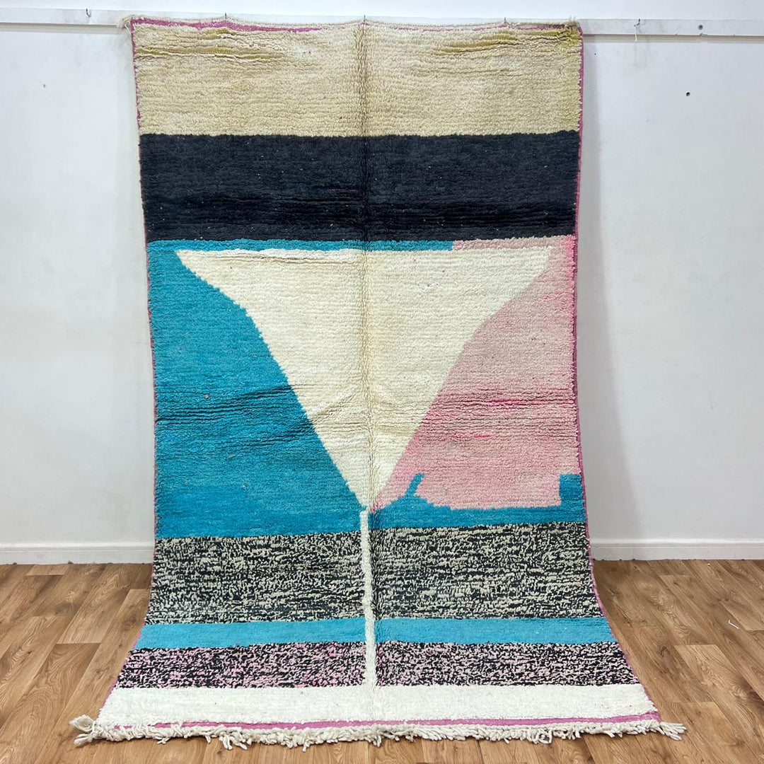 Vintage Moroccan wool rug 204 – handmade blue, cream, and pink geometric abstract Berber design (268 × 156 cm).