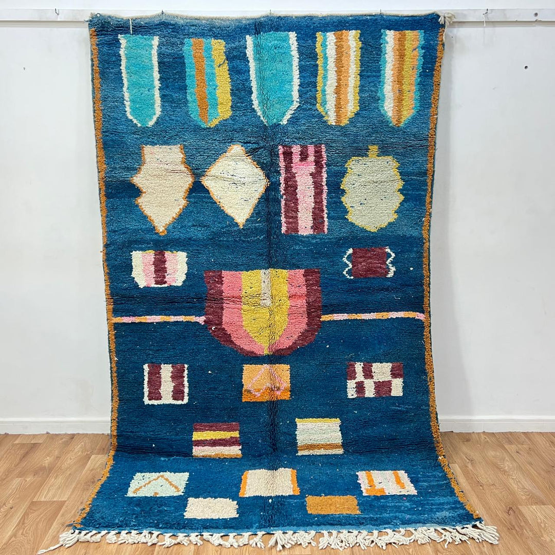 Vintage Moroccan wool rug 263 – handmade blue geometric Berber design with mustard and ivory accents (253 × 157 cm).