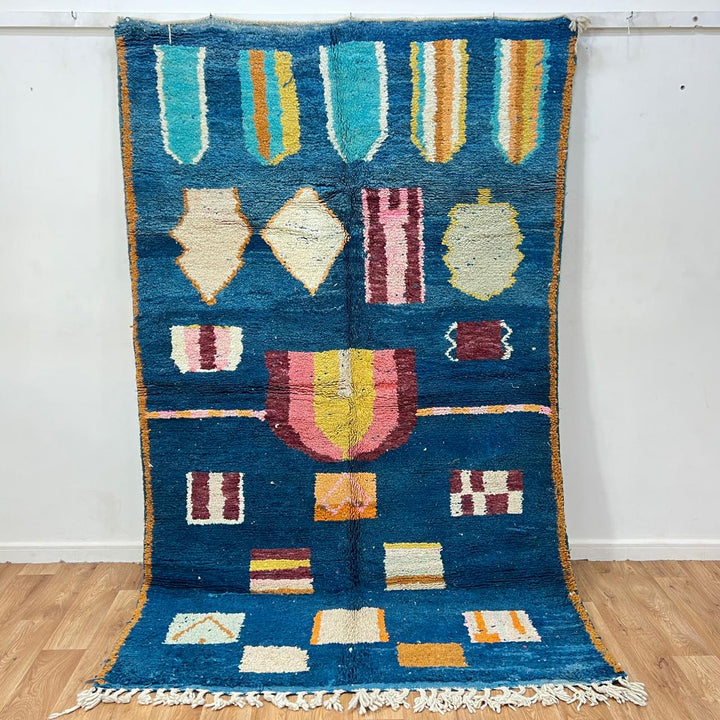 Vintage Moroccan wool rug 263 – handmade blue geometric Berber design with mustard and ivory accents (253 × 157 cm).