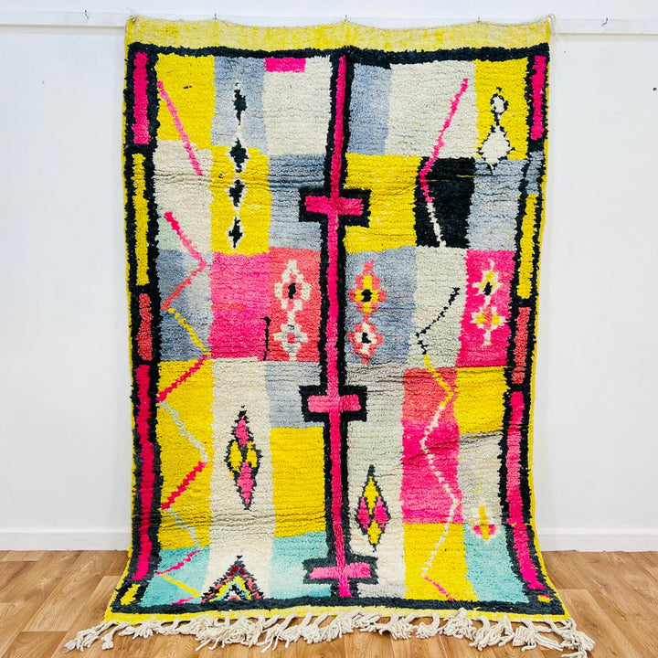 Colorful vintage Moroccan wool rug 629 handmade Berber shag with yellow, pink, and grey geometric patterns.