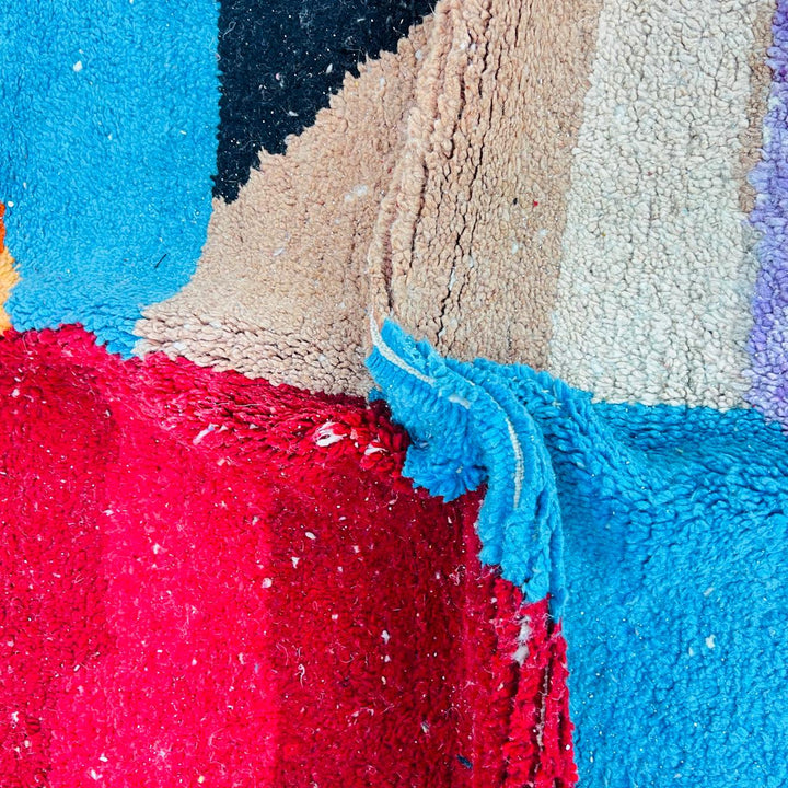 Vintage Moroccan Berber wool rug with abstract color block design in red, orange, blue and cream, handmade in Morocco, 263x172 cm