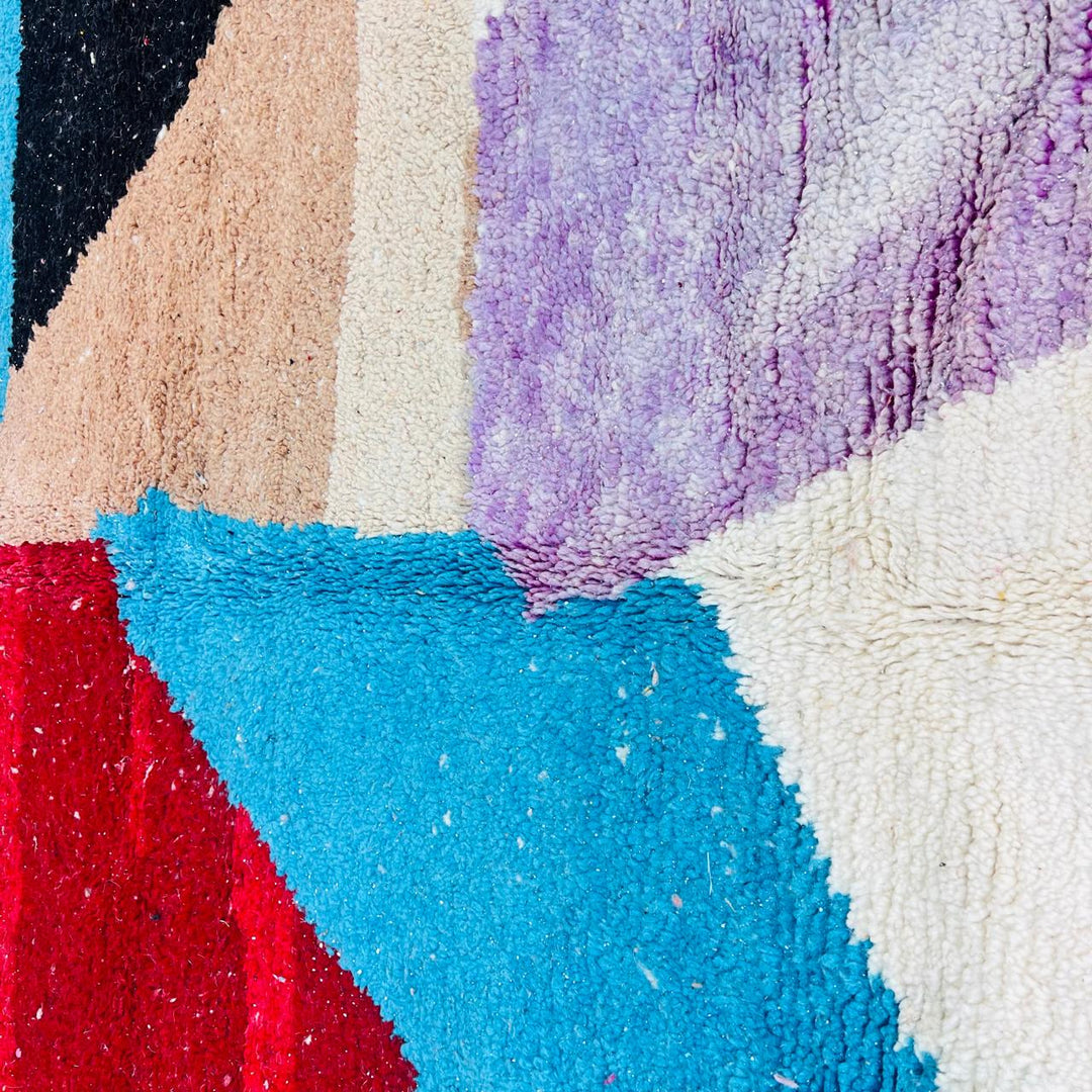 Vintage Moroccan Berber wool rug with abstract color block design in red, orange, blue and cream, handmade in Morocco, 263x172 cm