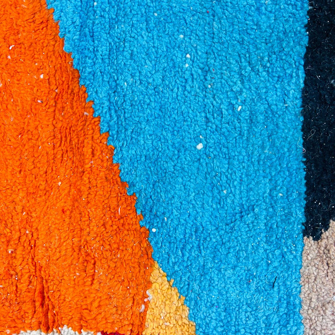 Vintage Moroccan Berber wool rug with abstract color block design in red, orange, blue and cream, handmade in Morocco, 263x172 cm