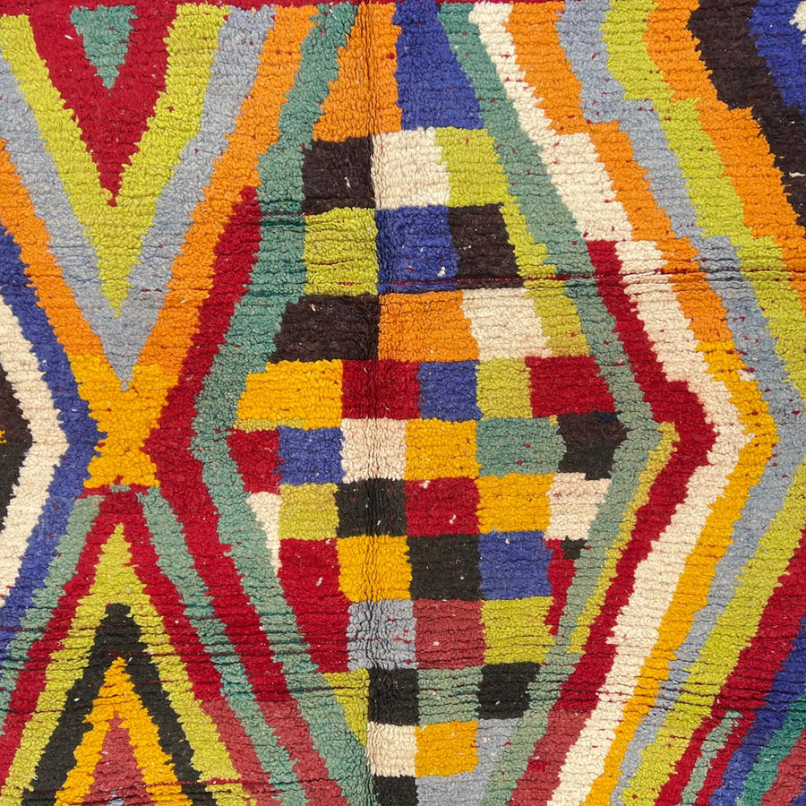 Vintage Moroccan wool rug with colorful chevron and geometric Berber pattern in red, mustard, green and ivory