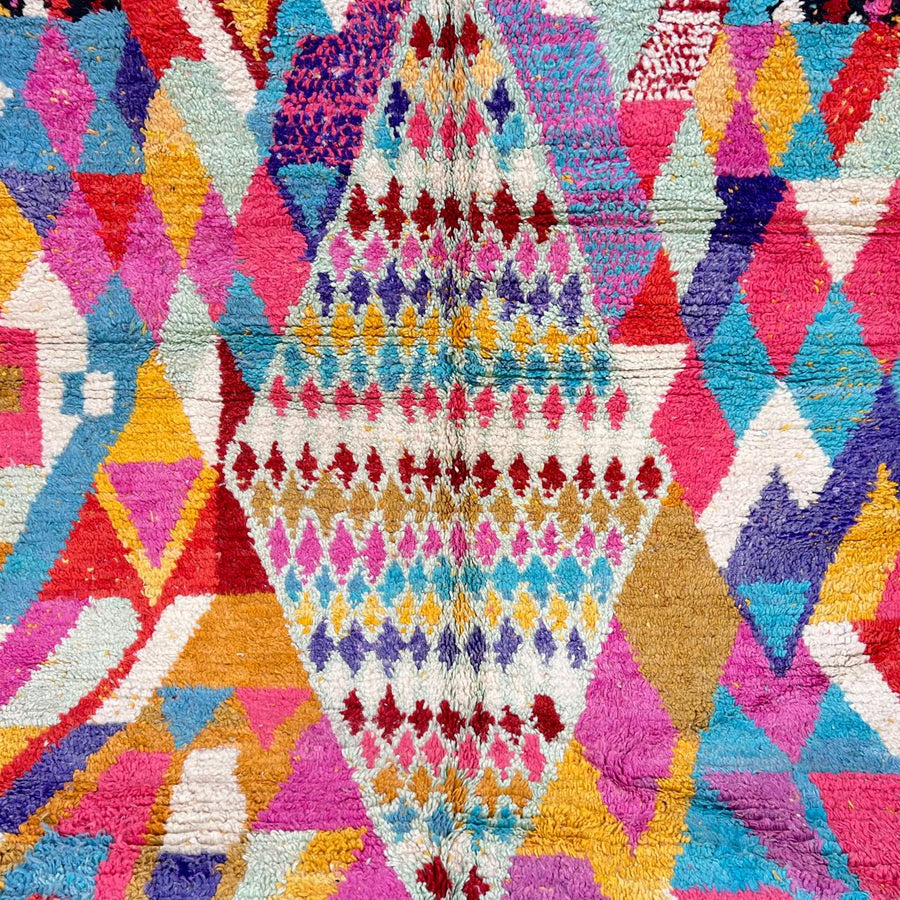 Vintage Moroccan wool rug with colorful diamond Berber pattern in pink, turquoise, mustard and ivory, handwoven in Morocco