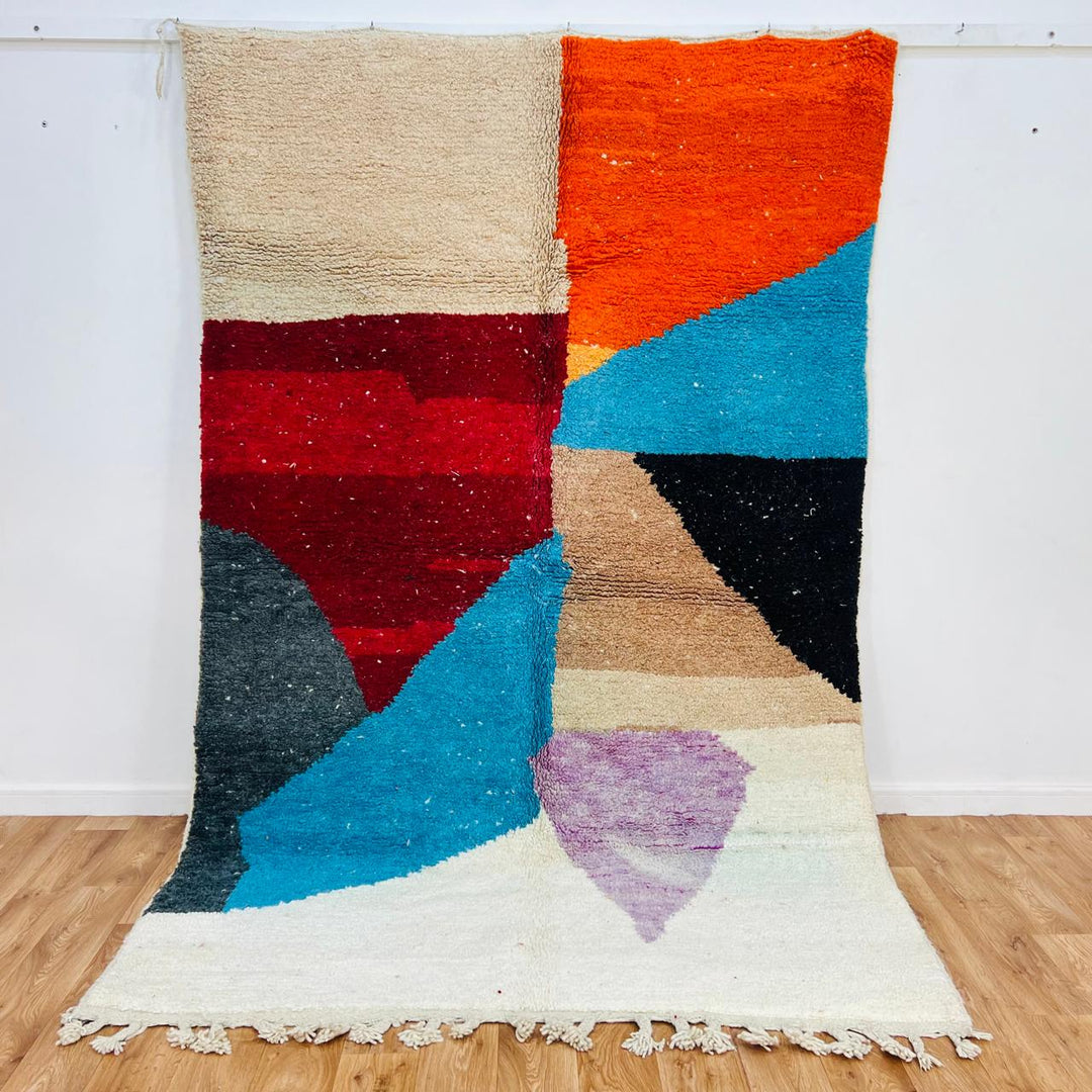 Vintage Moroccan Berber wool rug with abstract color block design in red, orange, blue and cream, handmade in Morocco, 263x172 cm