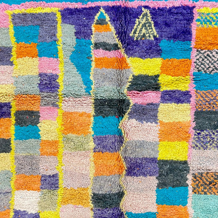 Vintage Moroccan wool rug with colorful geometric mosaic Berber pattern in mustard, orange, teal, pink and blue, handwoven in Morocco