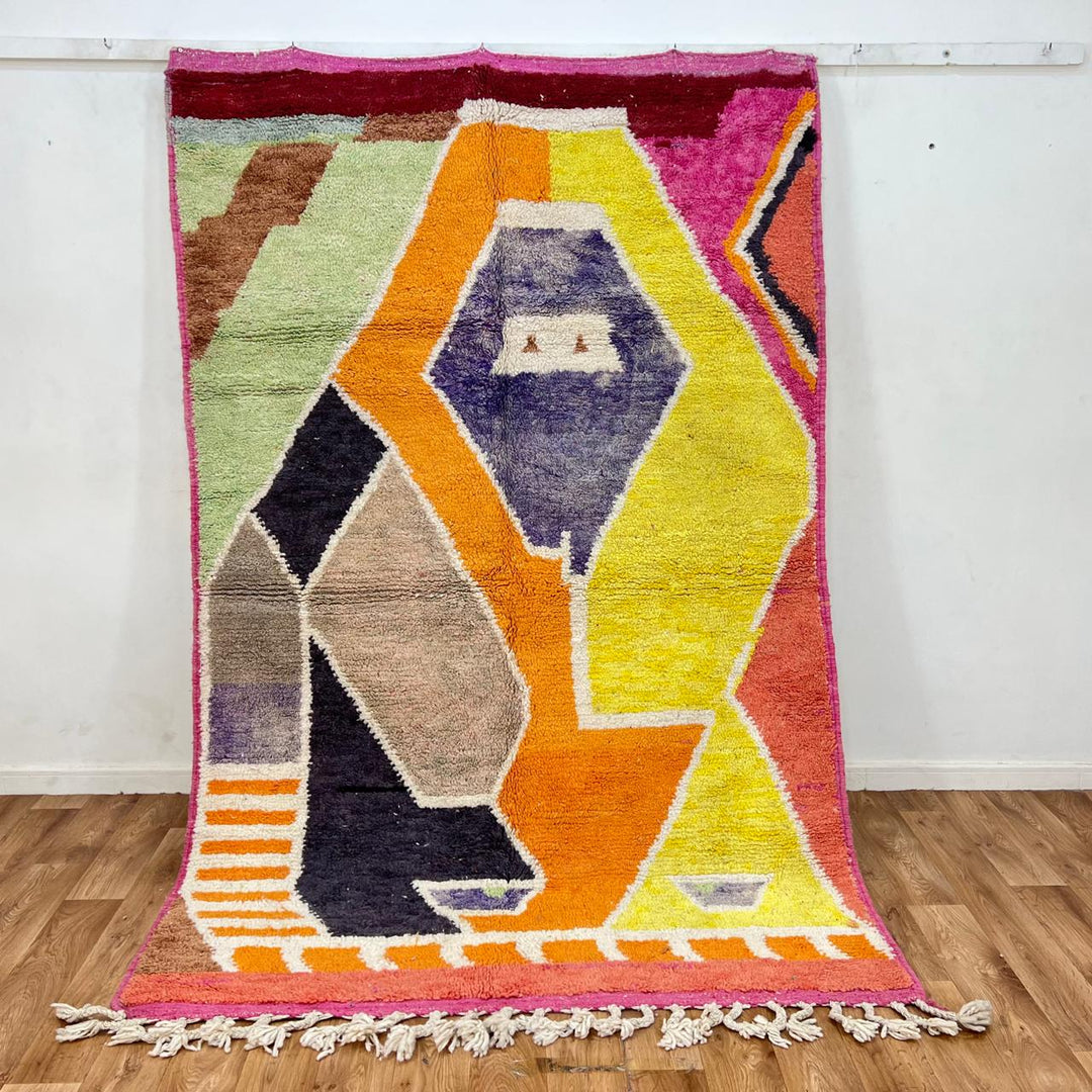 Vintage Moroccan wool rug with bold abstract geometric Berber design in yellow, orange, charcoal and neutral tones, handwoven in Morocco