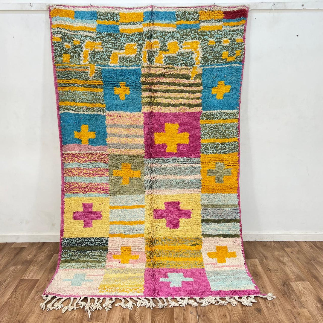 Vintage Moroccan wool rug with colorful Berber cross pattern in teal, yellow, pink and ivory, handwoven in Morocco