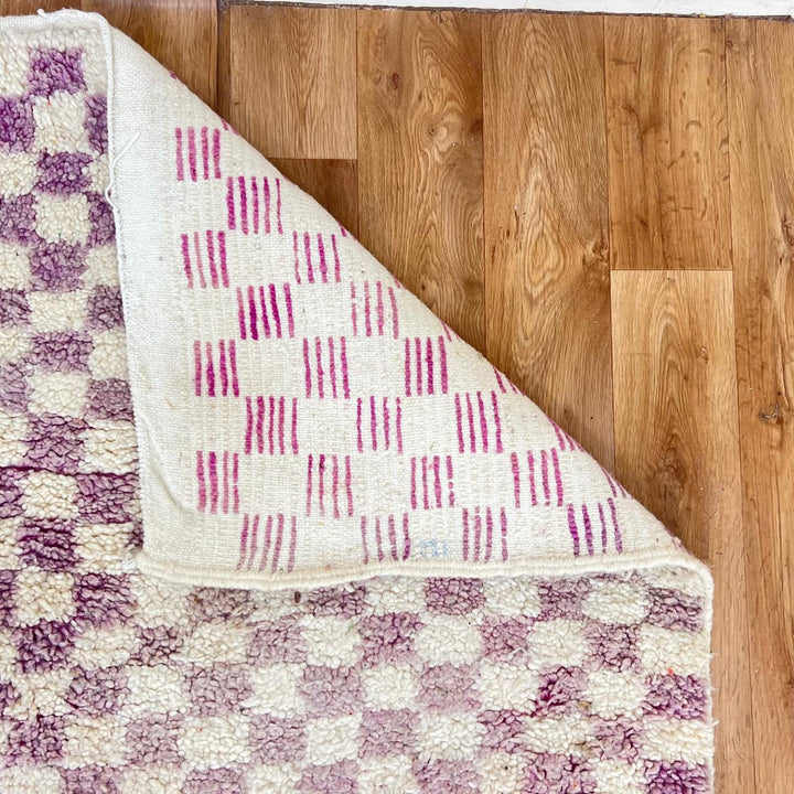 Vintage Moroccan wool rug with purple and ivory checkered Berber pattern, handwoven in Morocco