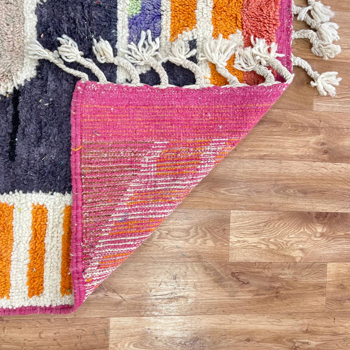 Vintage Moroccan wool rug with bold abstract geometric Berber design in yellow, orange, charcoal and neutral tones, handwoven in Morocco