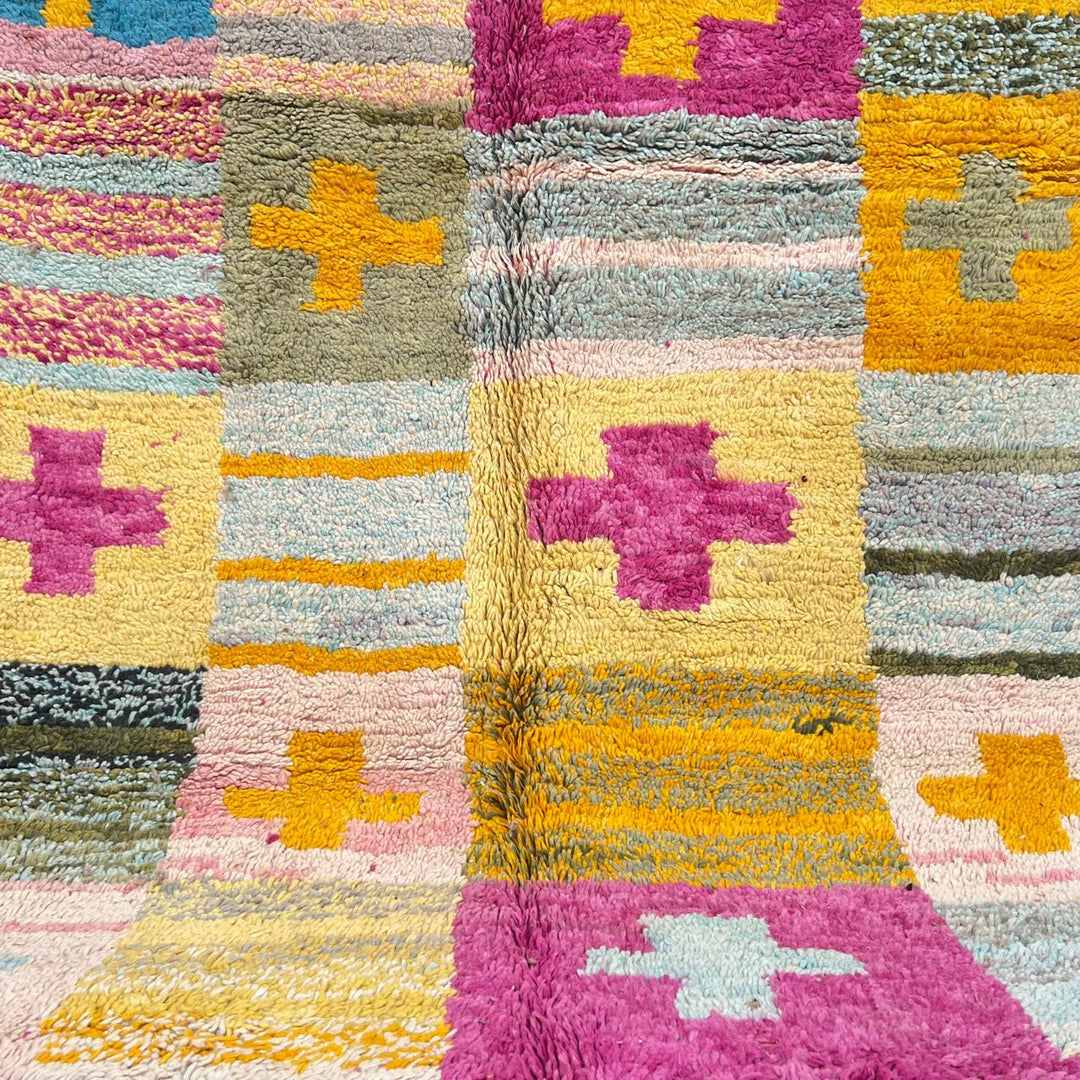 Vintage Moroccan wool rug with colorful Berber cross pattern in teal, yellow, pink and ivory, handwoven in Morocco