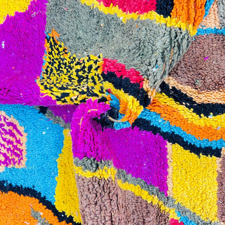 Vintage Moroccan Berber wool rug with abstract colorful patterns in orange, pink, blue and yellow, handmade in Morocco, 238x170 cm