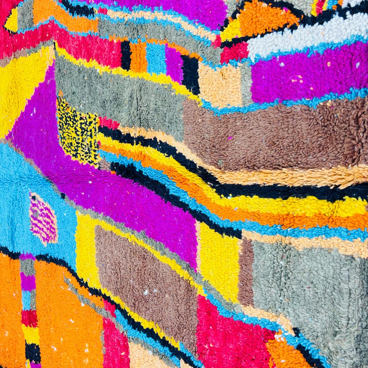 Vintage Moroccan Berber wool rug with abstract colorful patterns in orange, pink, blue and yellow, handmade in Morocco, 238x170 cm