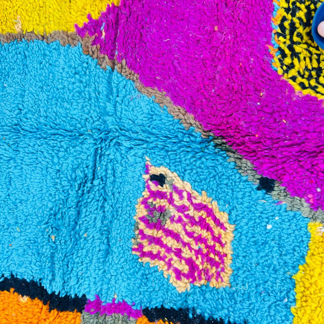 Vintage Moroccan Berber wool rug with abstract colorful patterns in orange, pink, blue and yellow, handmade in Morocco, 238x170 cm