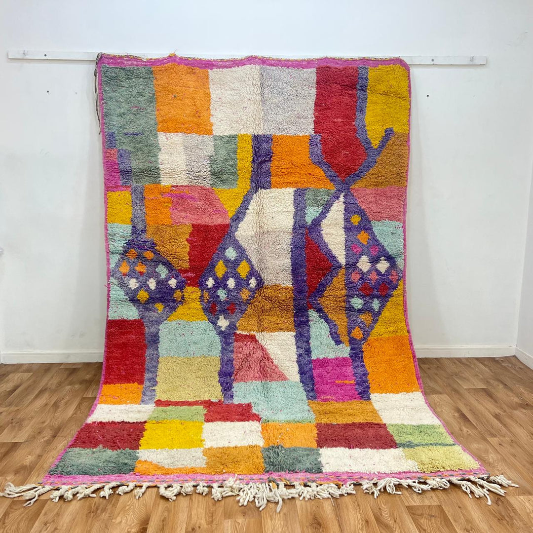 vintage moroccan berber rug with colorful geometric color-blocked pattern in wool