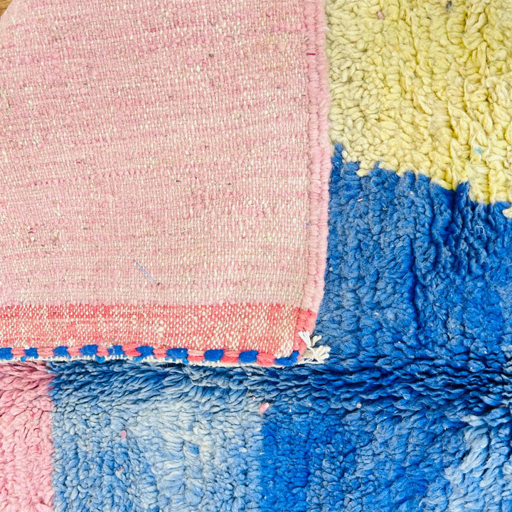 Vintage Moroccan Berber wool rug with pastel geometric color-block design in pink, blue, green and yellow, handmade in Morocco, 225x160 cm