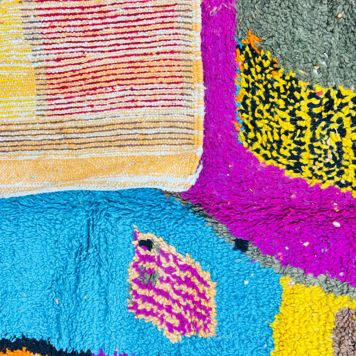Vintage Moroccan Berber wool rug with abstract colorful patterns in orange, pink, blue and yellow, handmade in Morocco, 238x170 cm