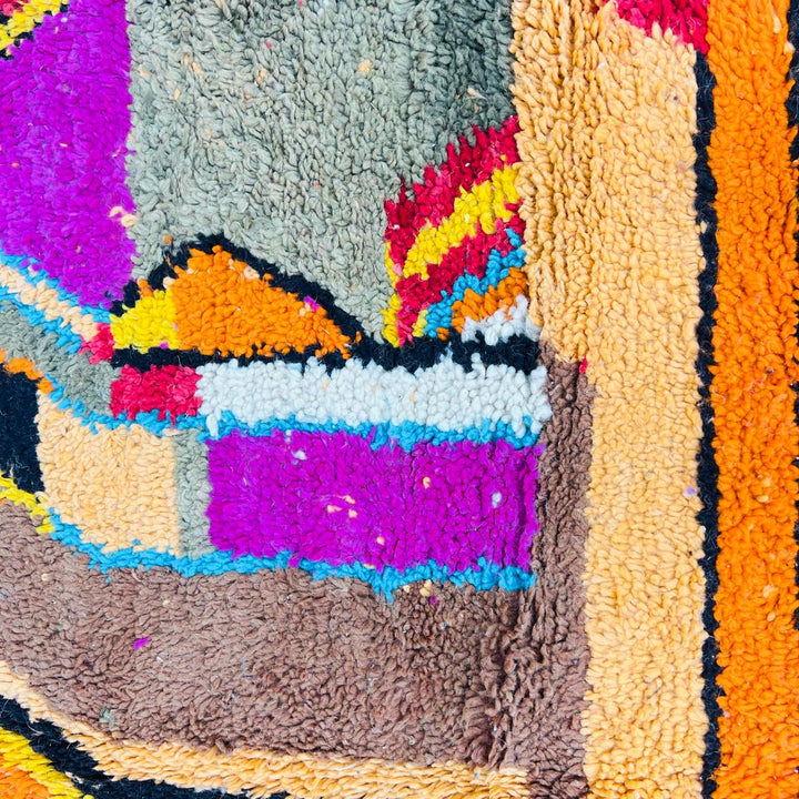 Vintage Moroccan Berber wool rug with abstract colorful patterns in orange, pink, blue and yellow, handmade in Morocco, 238x170 cm