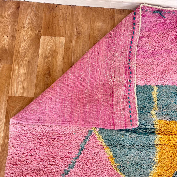 vintage pink moroccan abstract wool rug with geometric design