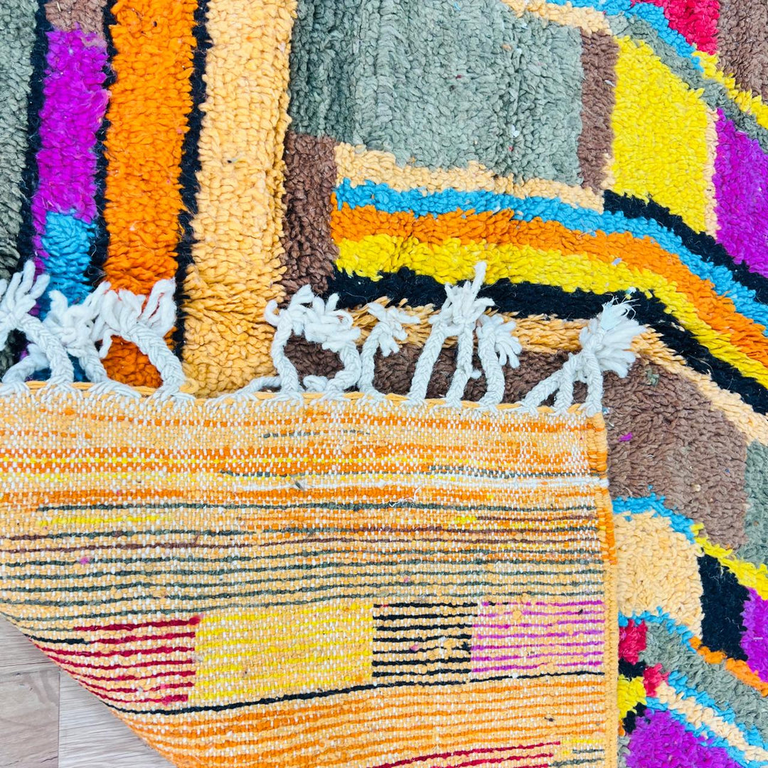 Vintage Moroccan Berber wool rug with abstract colorful patterns in orange, pink, blue and yellow, handmade in Morocco, 238x170 cm