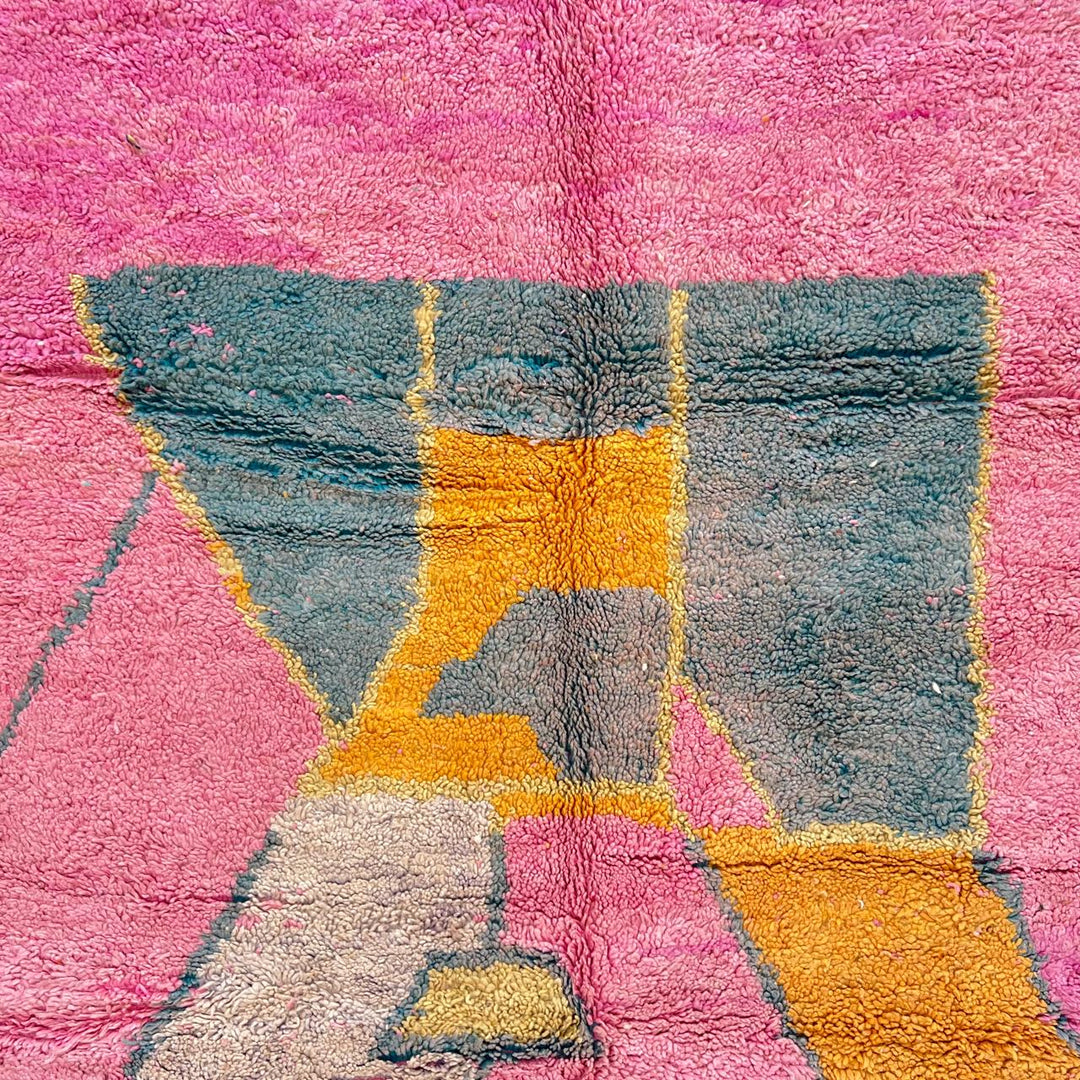 vintage pink moroccan abstract wool rug with geometric design